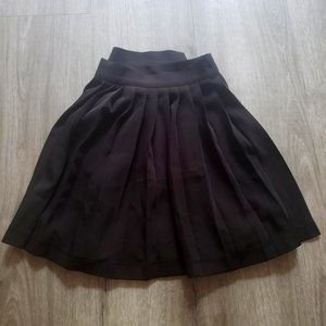 black pleated delias catalog mini skirt